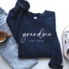personalized grandma est 2025 sweatshirt custom crewneck for pregnancy announcement unique grandma gift vbkg6 scaled
