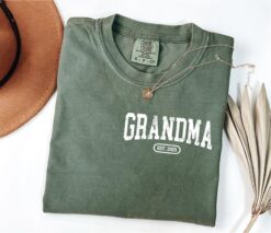 personalized grandma shirt with pocket grandma est year design perfect for announcements and grammy celebrations iwkdu