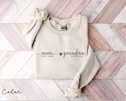personalized grandma sweater with custom year for new grandma pregnancy announcement and mothers day gift swzwc scaled