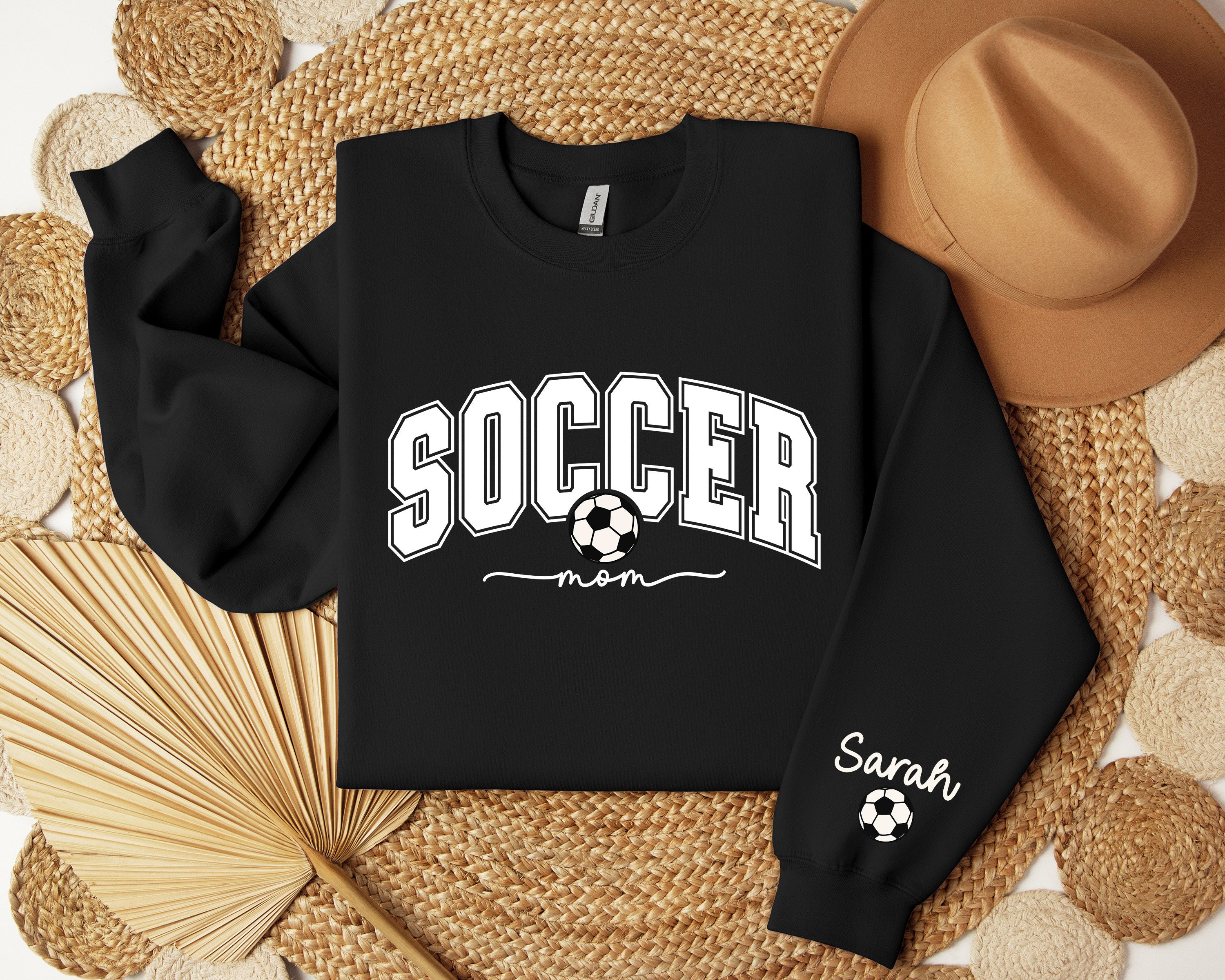 personalized soccer mom sweatshirt with kids name on sleeve for game day sports mom gift soccer mama hoodie laaon scaled