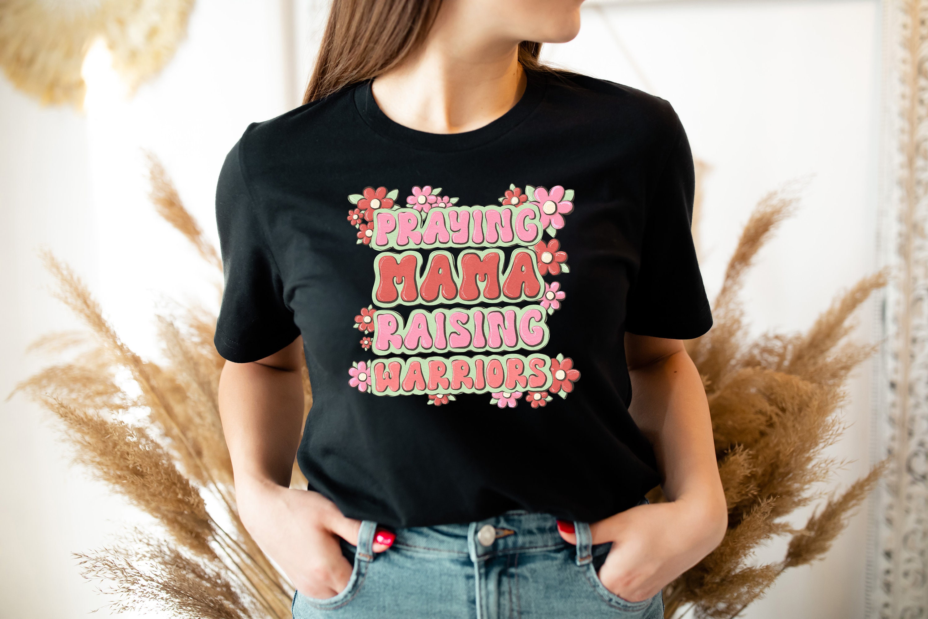 praying mama raising warriors shirt for christian moms funny mom life tee unique mothers day gift odeyd scaled