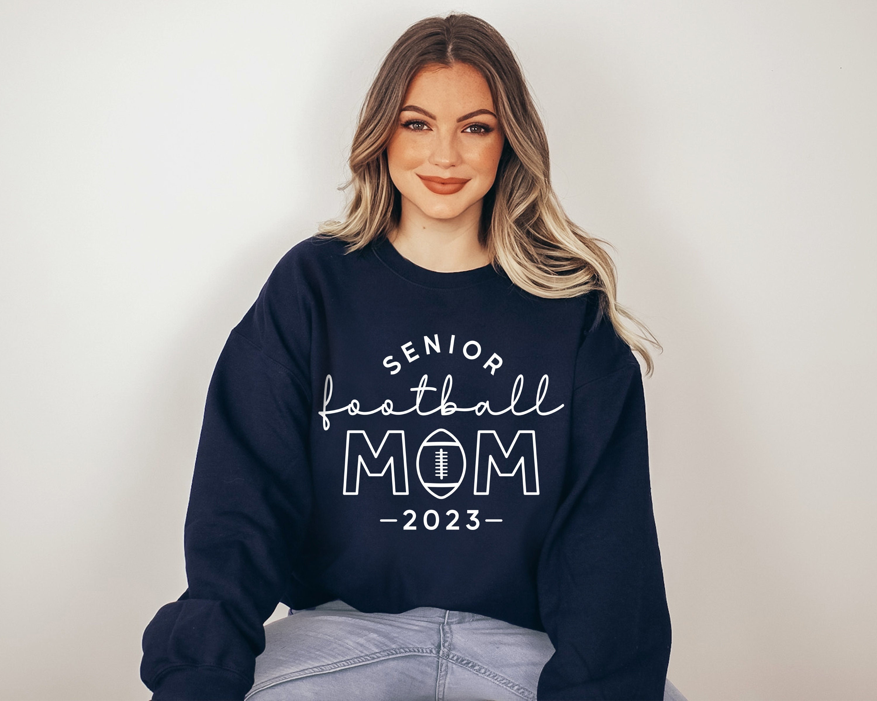 senior football mom sweatshirt for game day support funny football mom shirt unique christmas gift for moms fhtio scaled