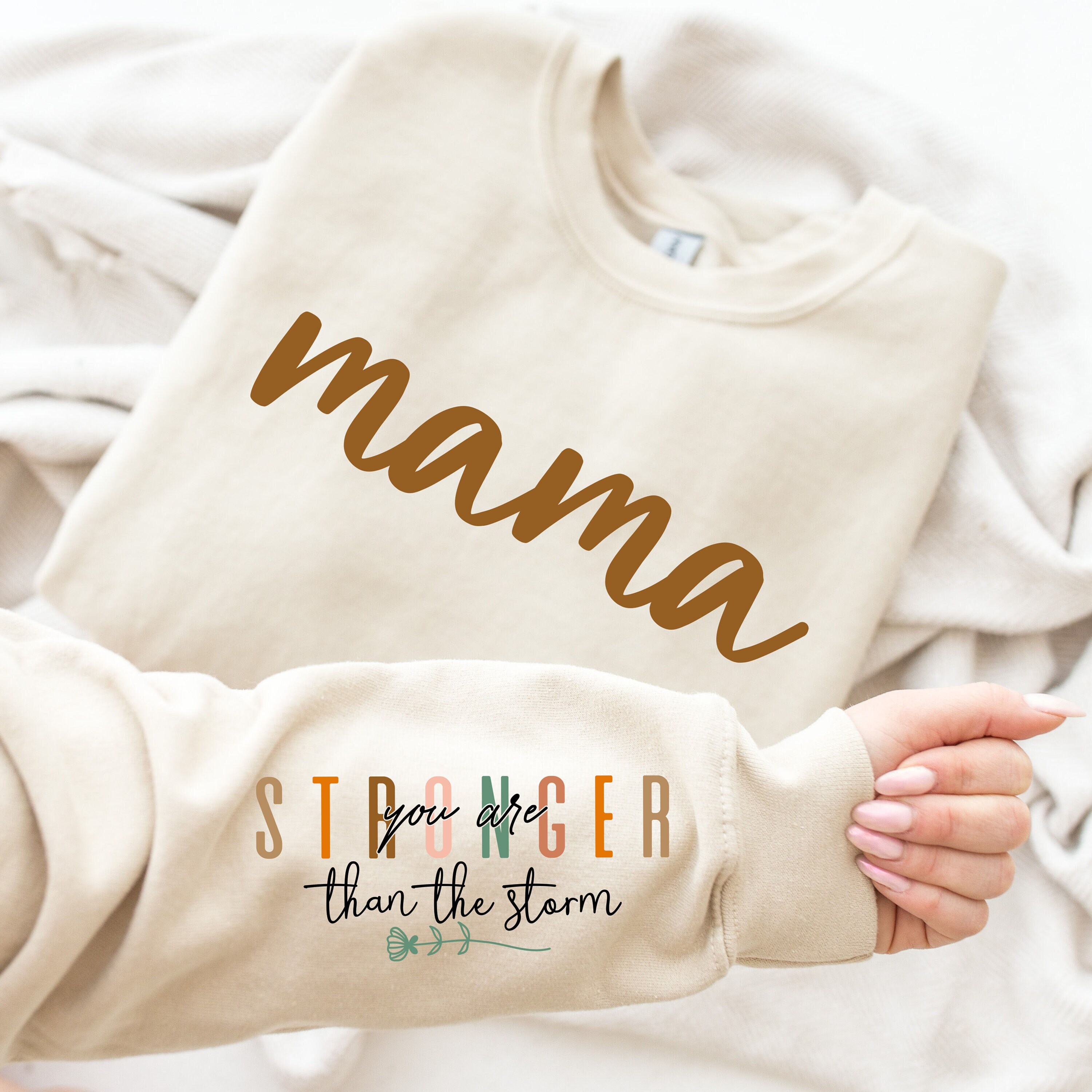 stronger than the storm mama sweatshirt with positive quotes for new moms best mom ever shirt na2c3