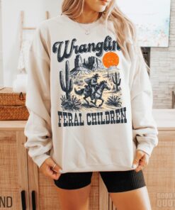 vintage raccoon sweatshirt with retro 90s western graphics for kids funny feral toddler shirt unique design awsnx